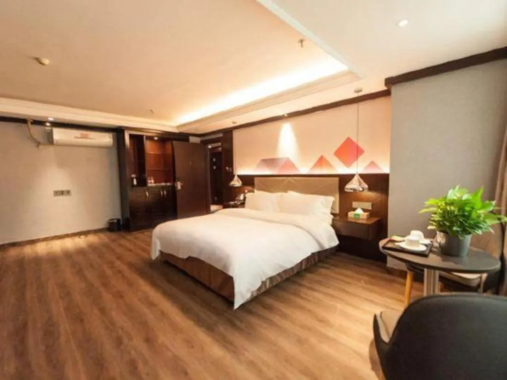 Bed in Borrman Hotel Zhongshan Henglan Xiyong