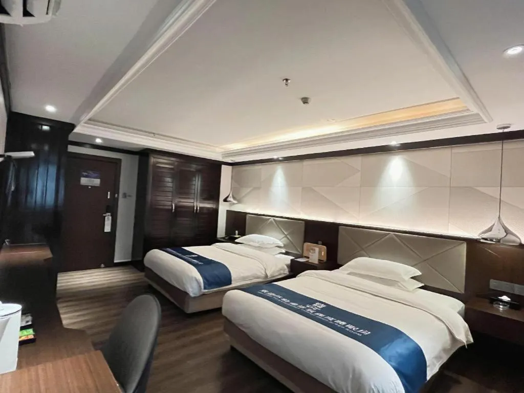 Bed in Borrman Hotel Zhongshan Henglan Xiyong