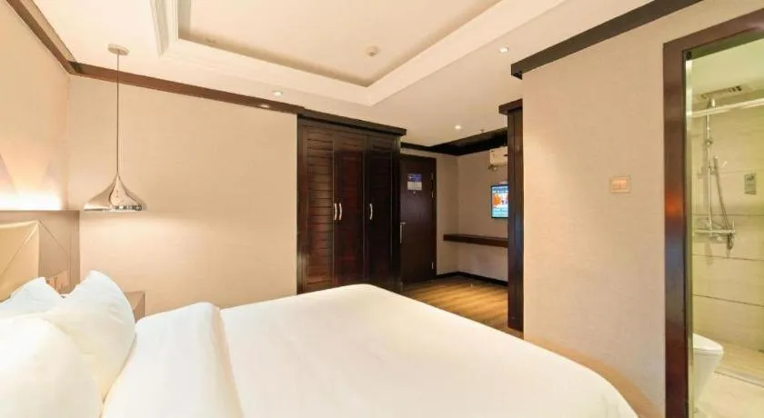 Bed in Borrman Hotel Zhongshan Henglan Xiyong