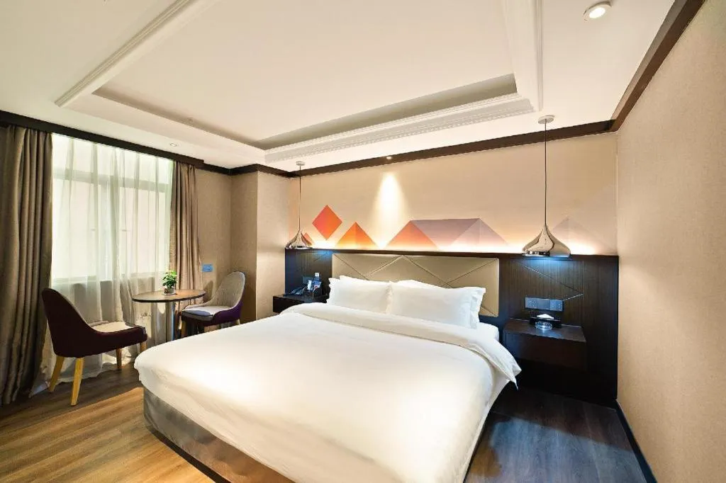 Bed in Borrman Hotel Zhongshan Henglan Xiyong