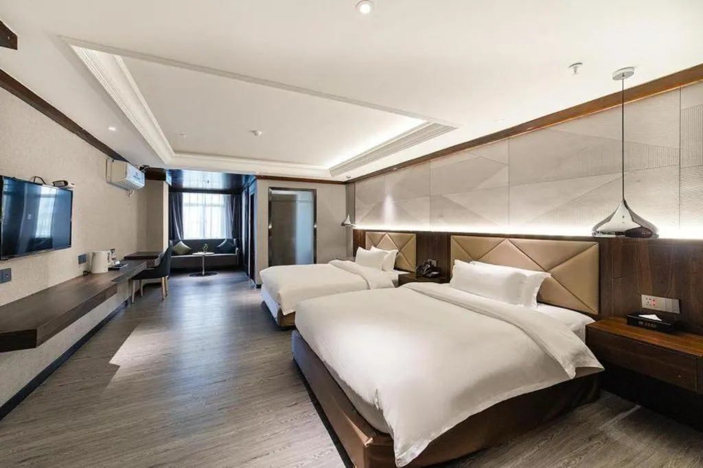 Bed in Borrman Hotel Zhongshan Henglan Xiyong