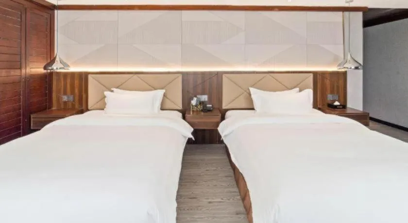 Bed in Borrman Hotel Zhongshan Henglan Xiyong