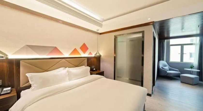 Bed in Borrman Hotel Zhongshan Henglan Xiyong