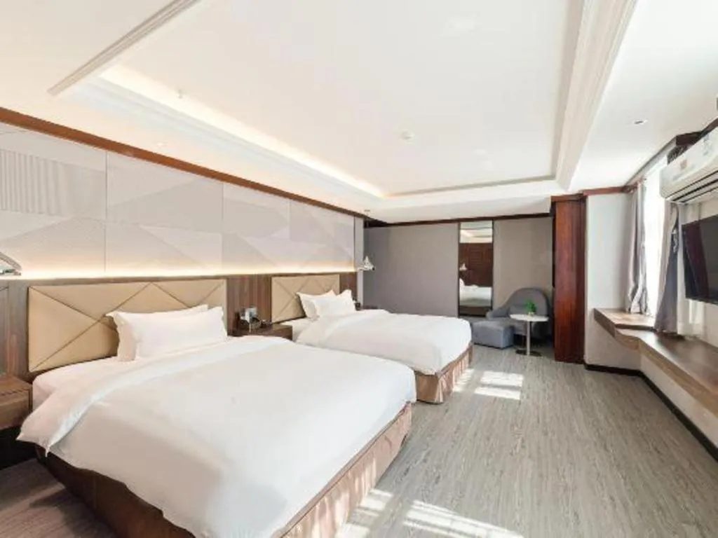 Bed in Borrman Hotel Zhongshan Henglan Xiyong