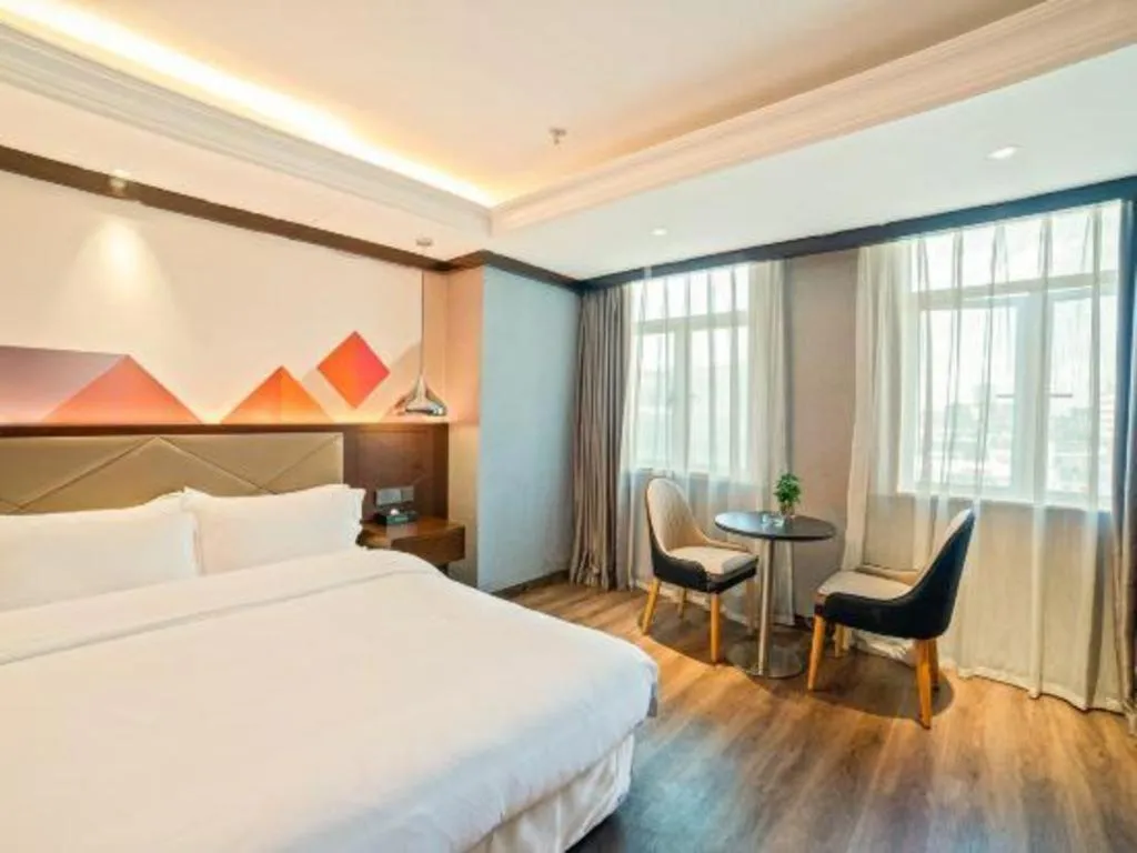 Bed in Borrman Hotel Zhongshan Henglan Xiyong