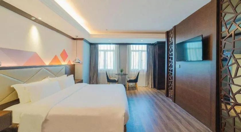 Bed in Borrman Hotel Zhongshan Henglan Xiyong