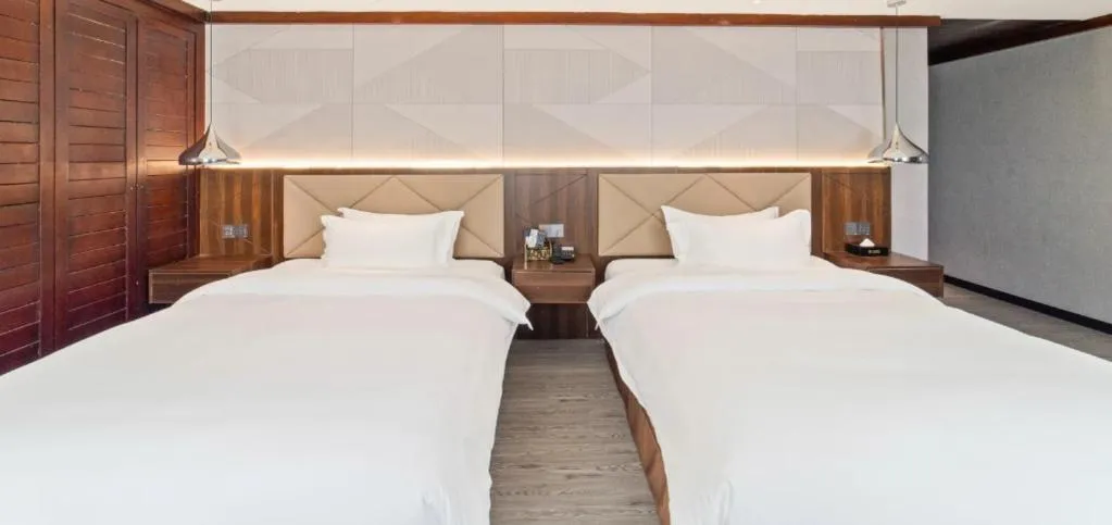 Bed in Borrman Hotel Zhongshan Henglan Xiyong