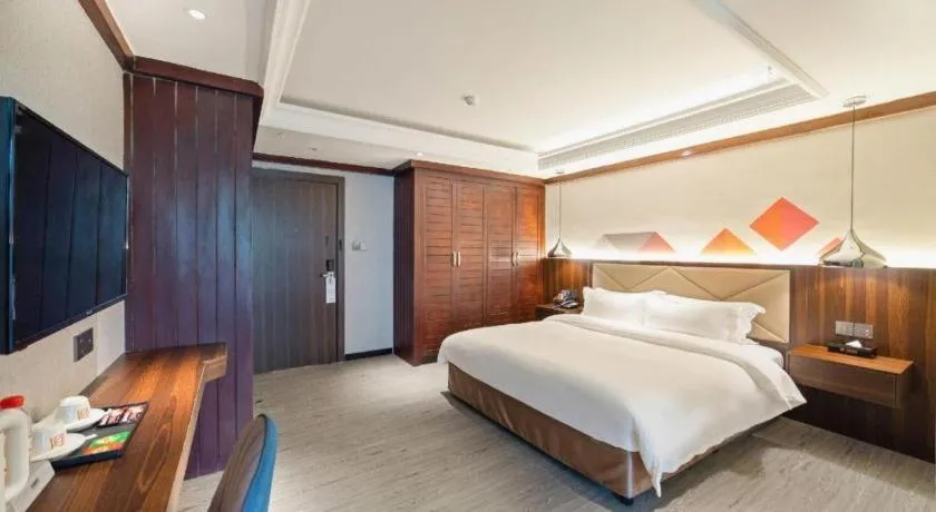 Bed in Borrman Hotel Zhongshan Henglan Xiyong