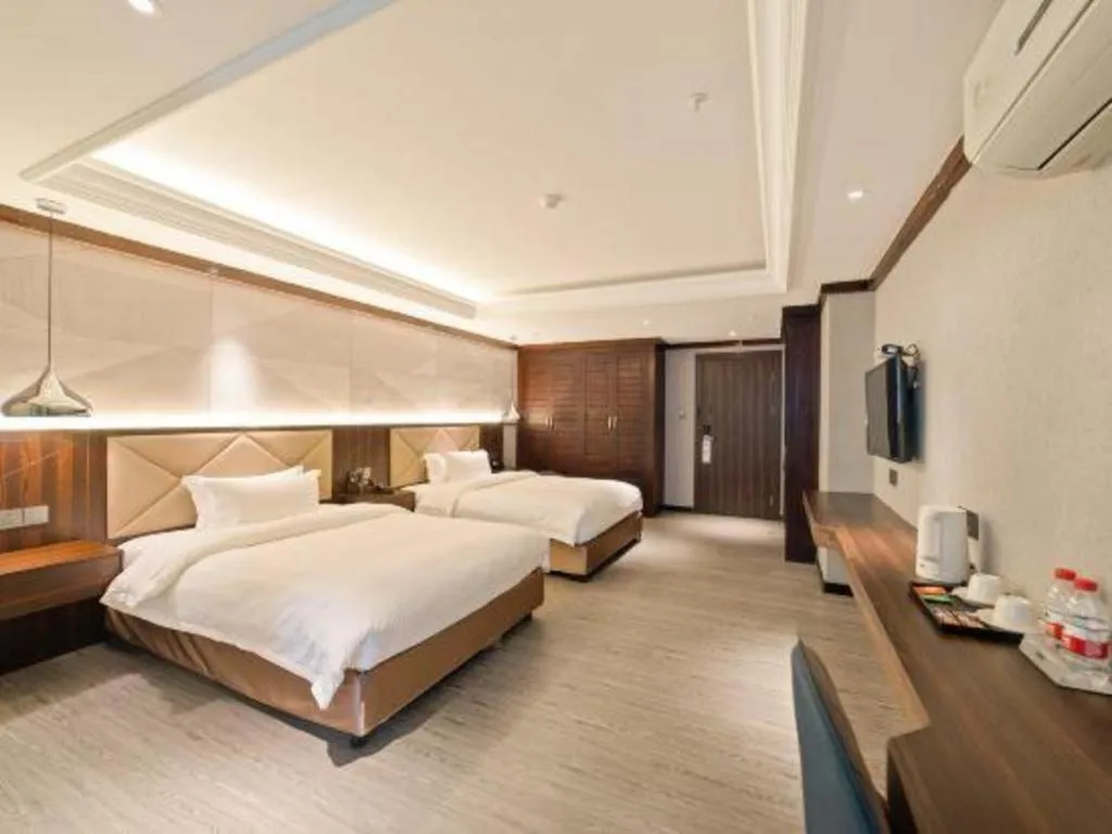 Bed in Borrman Hotel Zhongshan Henglan Xiyong