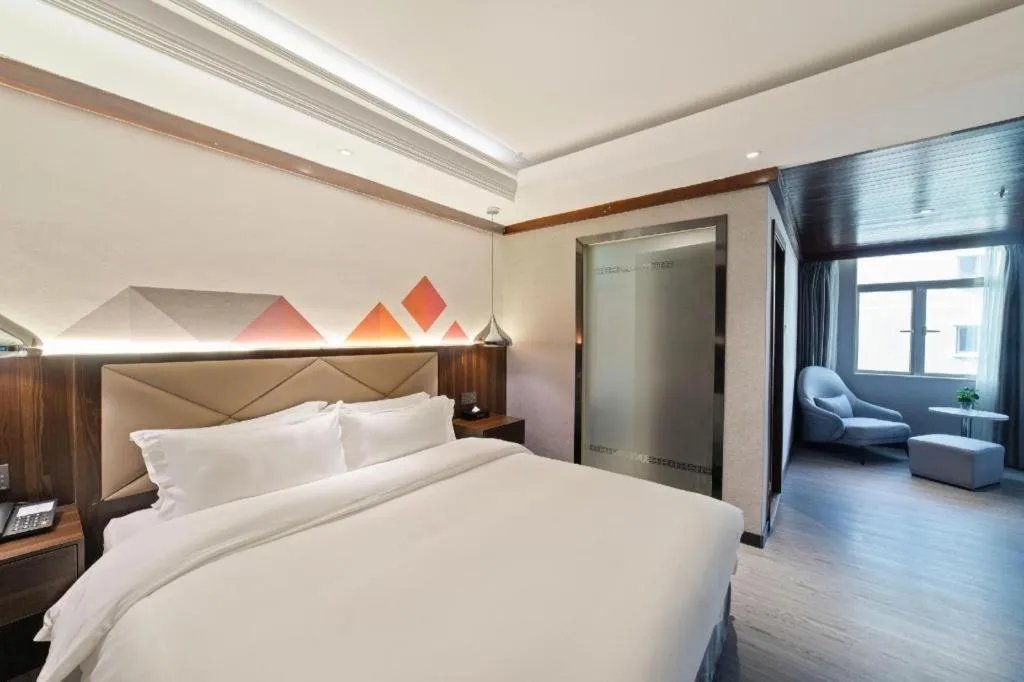 Bed in Borrman Hotel Zhongshan Henglan Xiyong