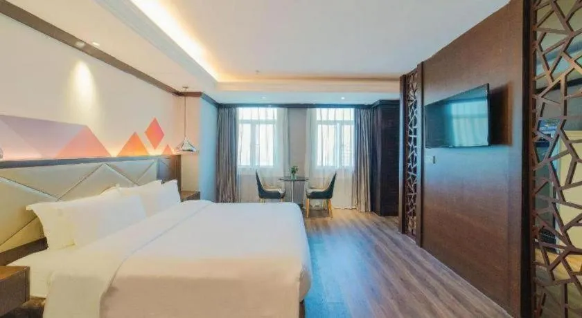 Bed in Borrman Hotel Zhongshan Henglan Xiyong
