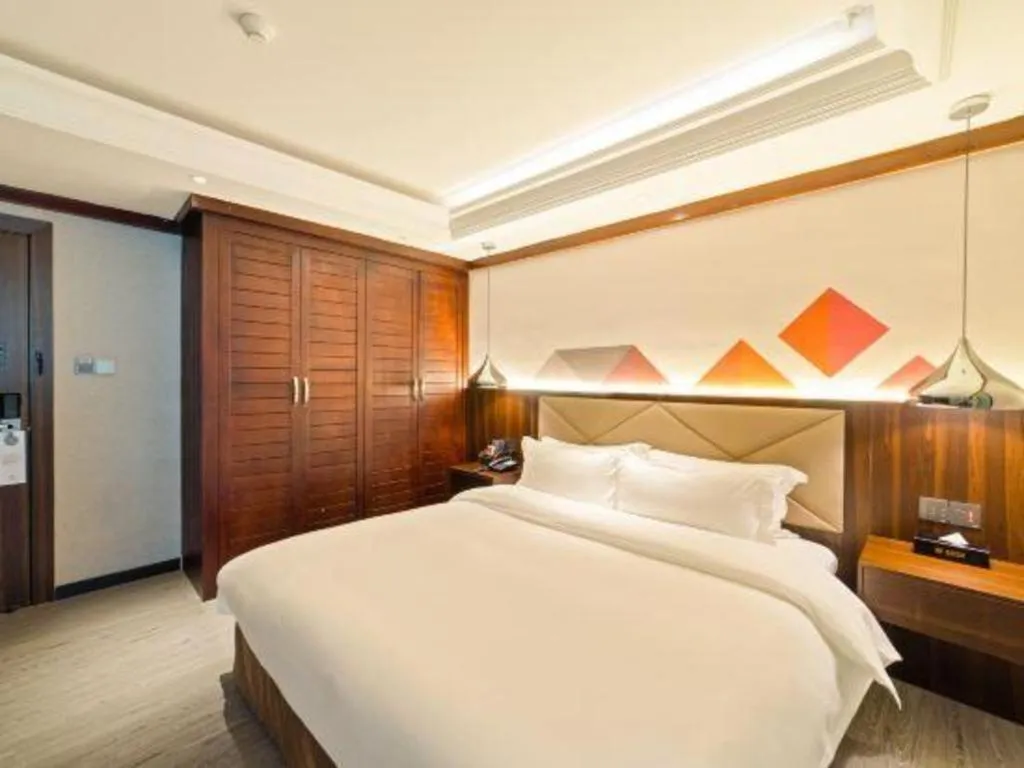 Bed in Borrman Hotel Zhongshan Henglan Xiyong