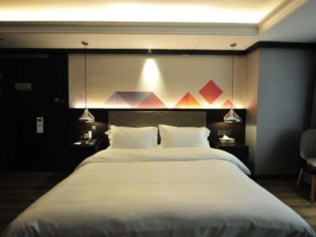 Bed in Borrman Hotel Zhongshan Henglan Xiyong