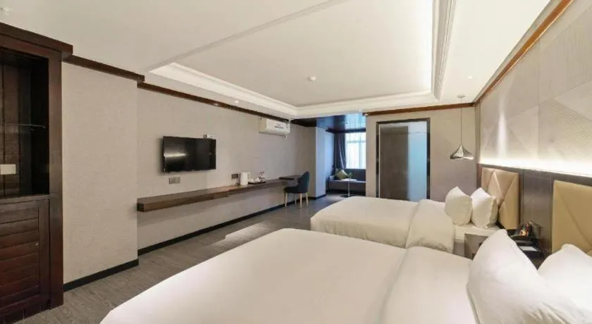 Bed in Borrman Hotel Zhongshan Henglan Xiyong