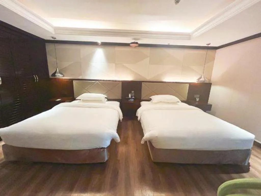 Bed in Borrman Hotel Zhongshan Henglan Xiyong