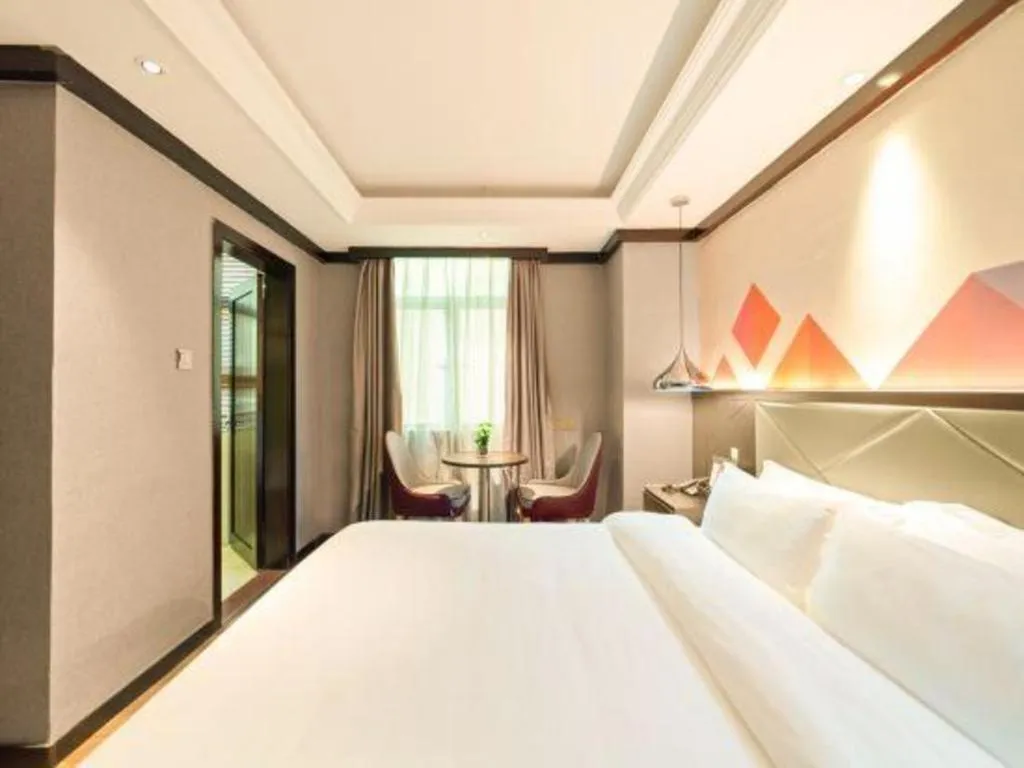 Bed in Borrman Hotel Zhongshan Henglan Xiyong