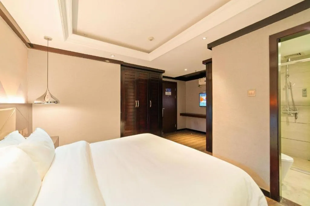 Bed in Borrman Hotel Zhongshan Henglan Xiyong