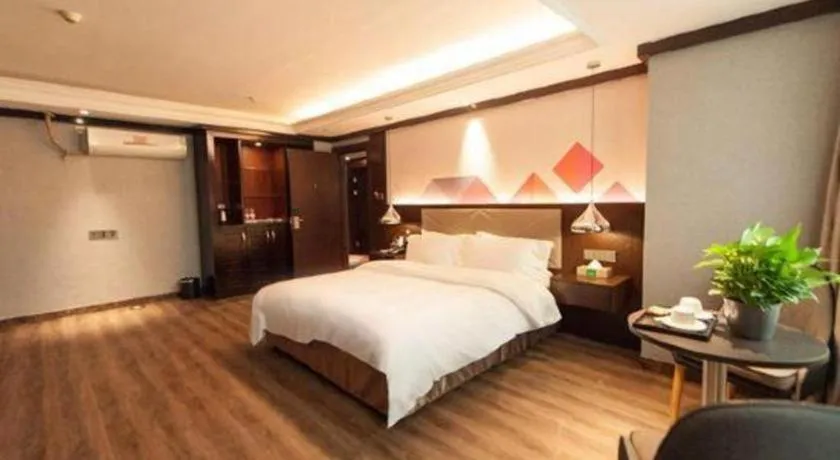 Bed in Borrman Hotel Zhongshan Henglan Xiyong