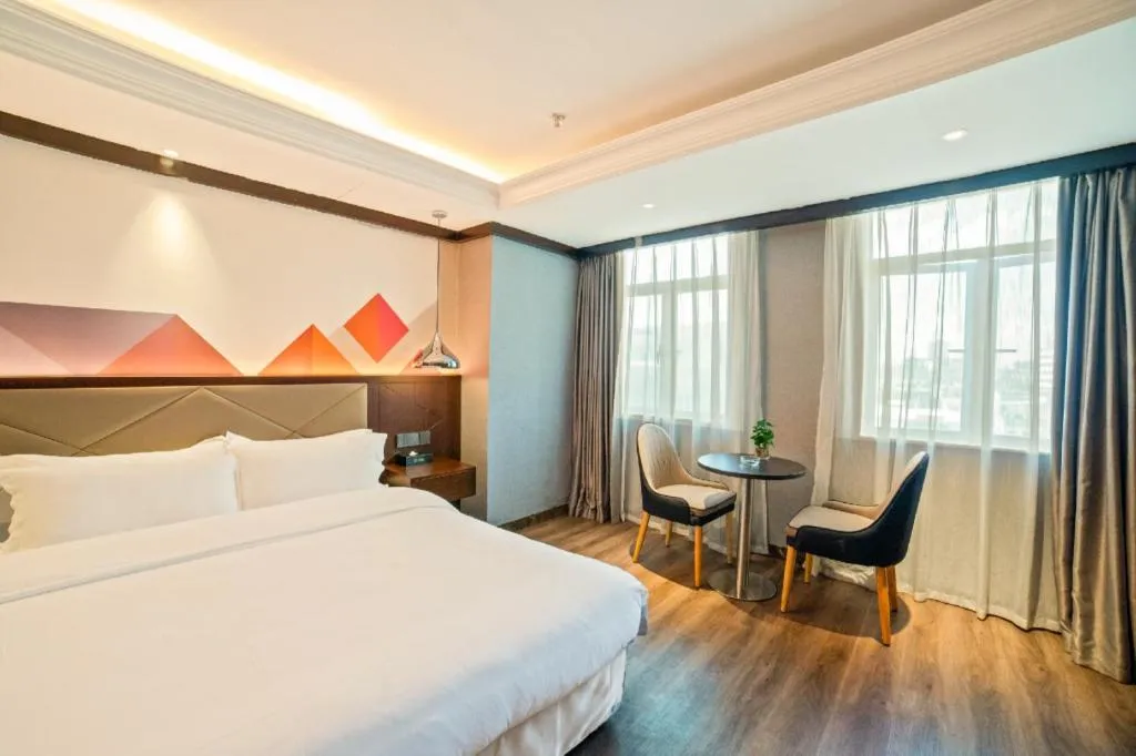 Bed in Borrman Hotel Zhongshan Henglan Xiyong