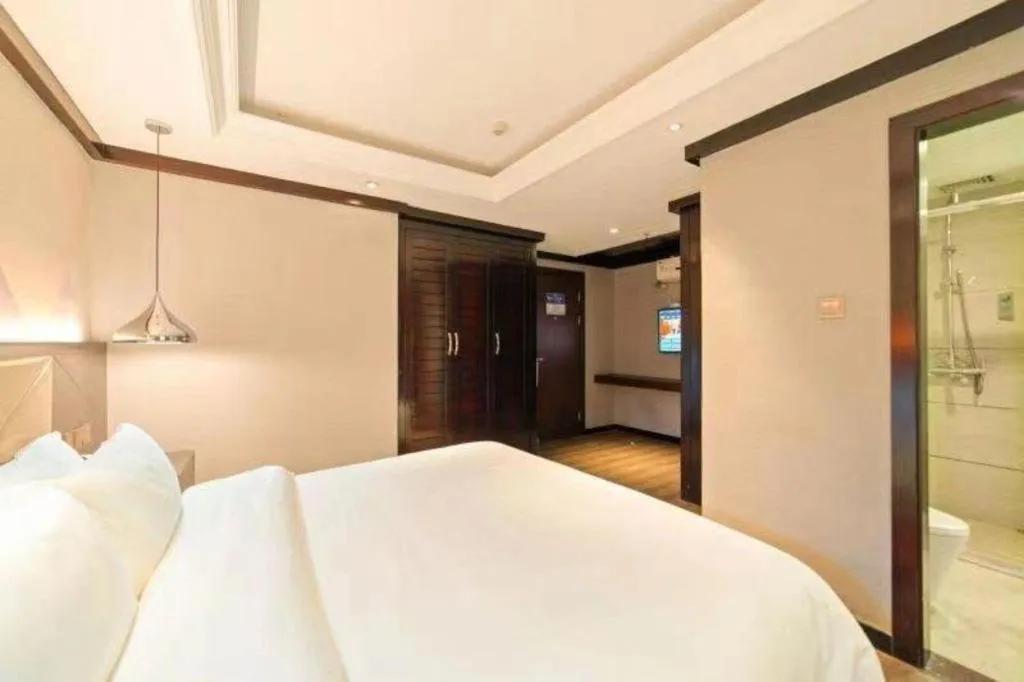 Bed in Borrman Hotel Zhongshan Henglan Xiyong