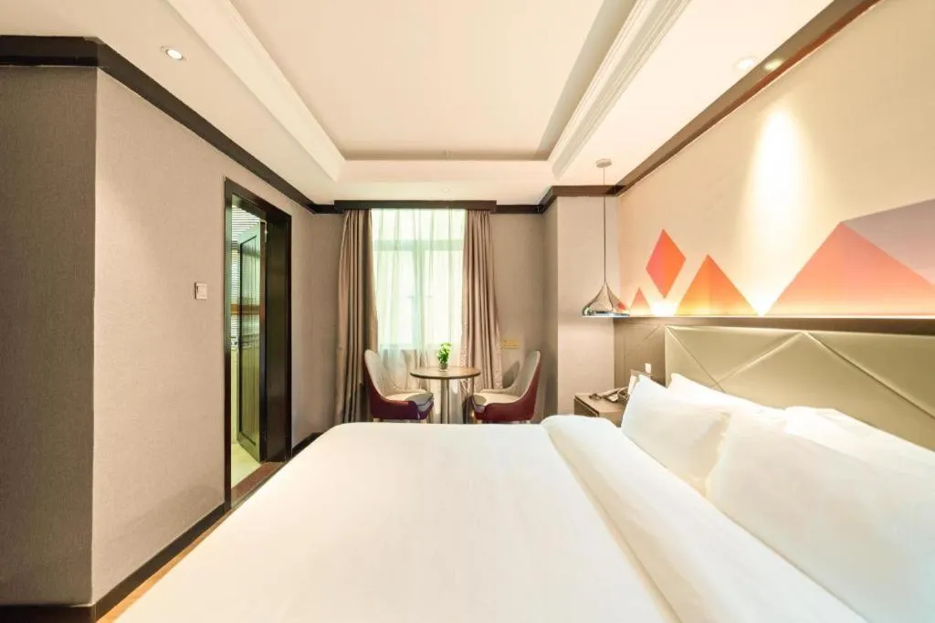 Bed in Borrman Hotel Zhongshan Henglan Xiyong