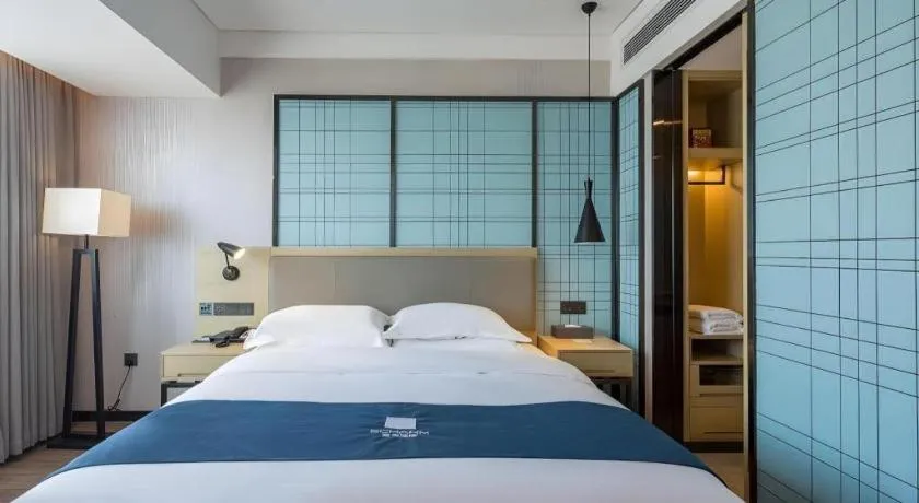 Bed in Echarm Hotel Changsha Xiangya Fushan