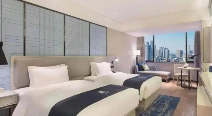 Bed in Echarm Hotel Changsha Xiangya Fushan