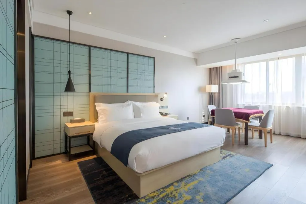 Bed in Echarm Hotel Changsha Xiangya Fushan