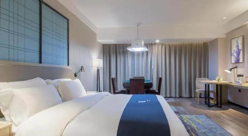 Bed in Echarm Hotel Changsha Xiangya Fushan
