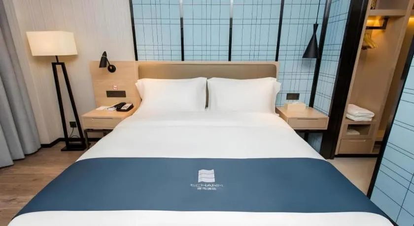 Bed in Echarm Hotel Changsha Xiangya Fushan