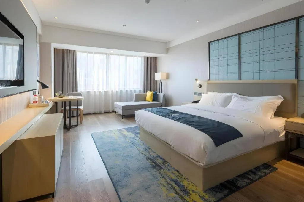 Bed in Echarm Hotel Changsha Xiangya Fushan