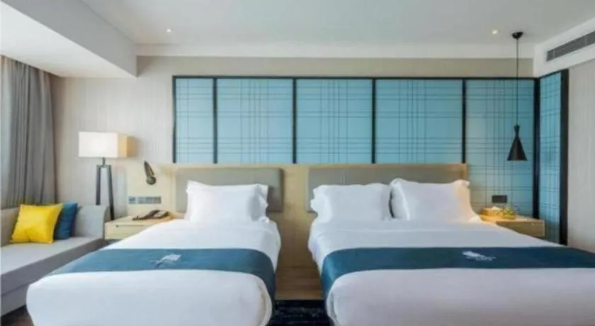 Bed in Echarm Hotel Changsha Xiangya Fushan
