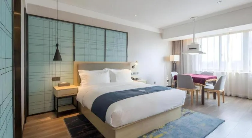 Bed in Echarm Hotel Changsha Xiangya Fushan