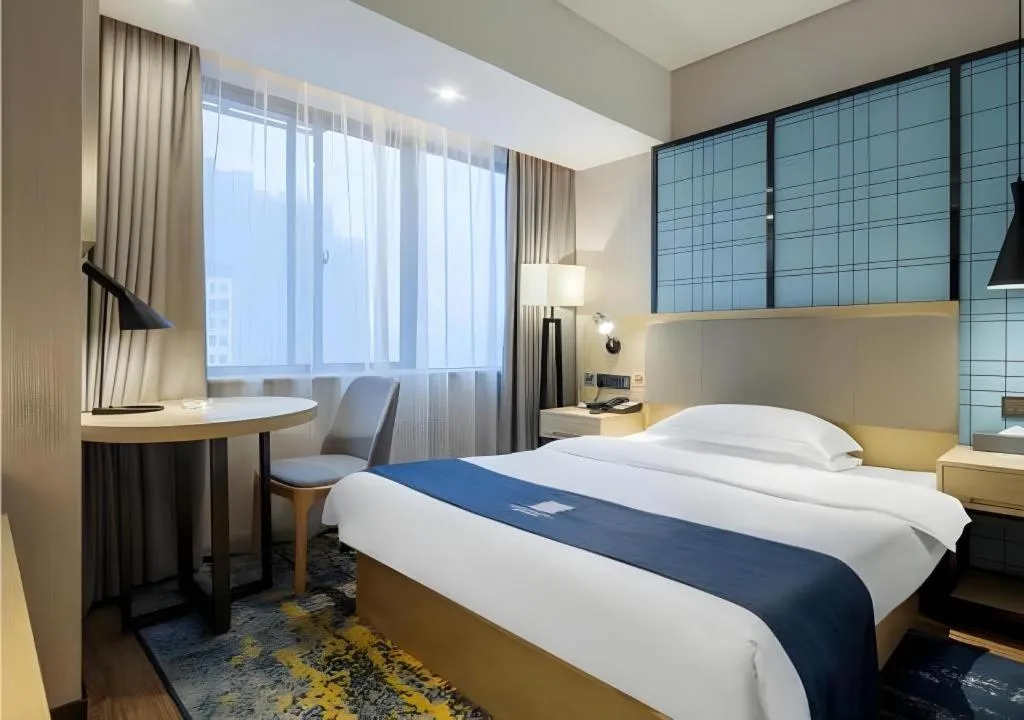 Bed in Echarm Hotel Changsha Xiangya Fushan
