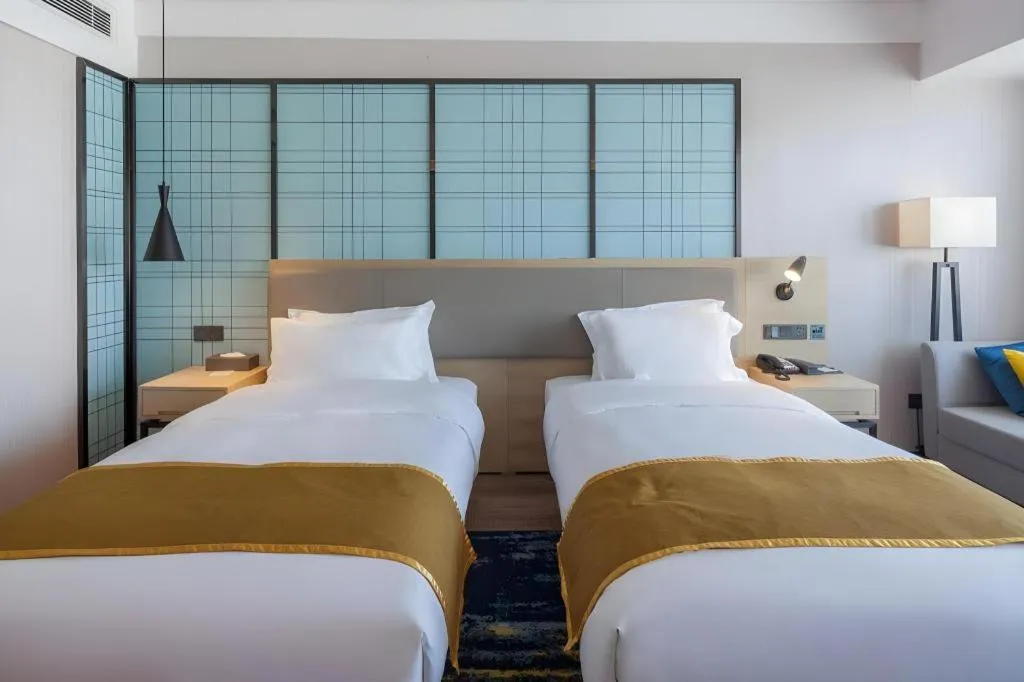 Bed in Echarm Hotel Changsha Xiangya Fushan