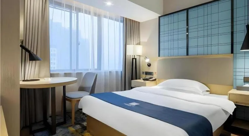 Bed in Echarm Hotel Changsha Xiangya Fushan