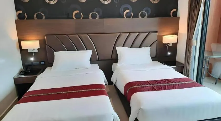 Bed in Constancy Jomtien Pattaya Hotel