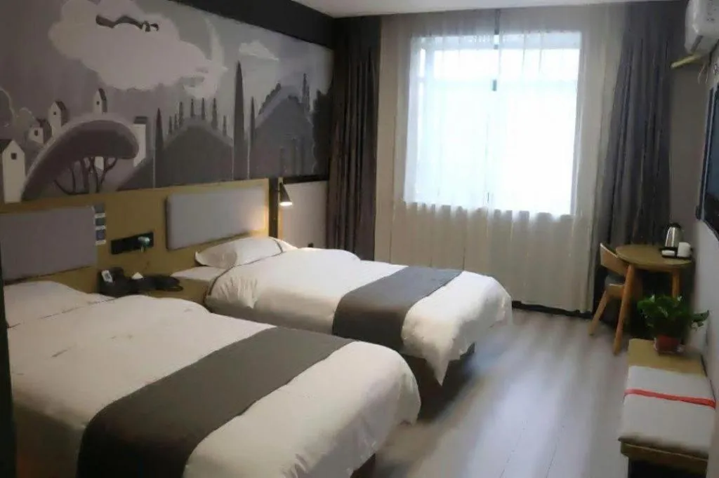 Bed in Thank Inn Hotel Anqing Guangcai Big Market Passenger Center