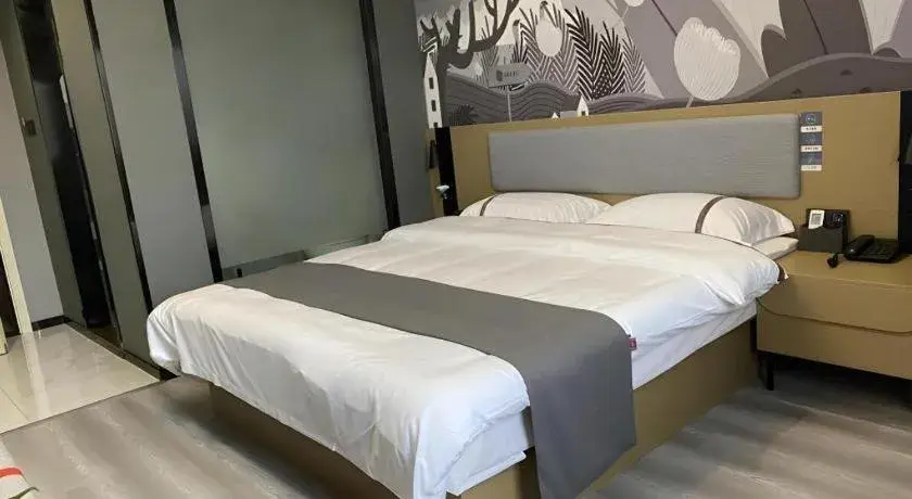 Bed in Thank Inn Hotel Anqing Guangcai Big Market Passenger Center Bed in Thank Inn Hotel Anqing Guangcai Big Market Passenger Center