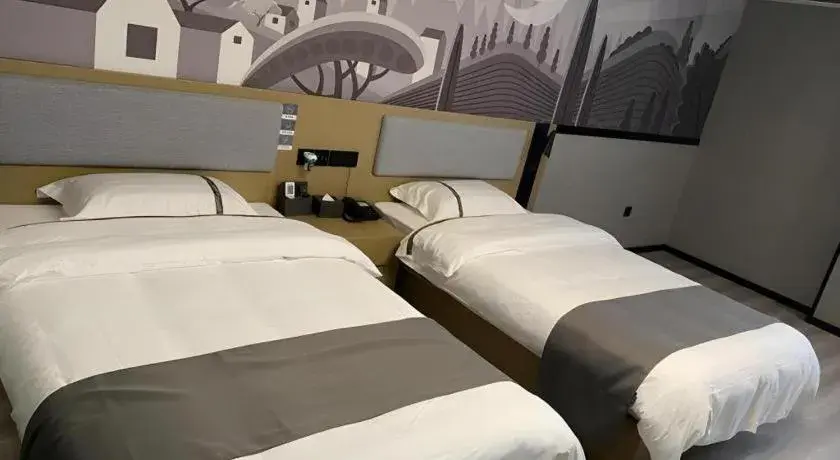 Bed in Thank Inn Hotel Anqing Guangcai Big Market Passenger Center Bed in Thank Inn Hotel Anqing Guangcai Big Market Passenger Center