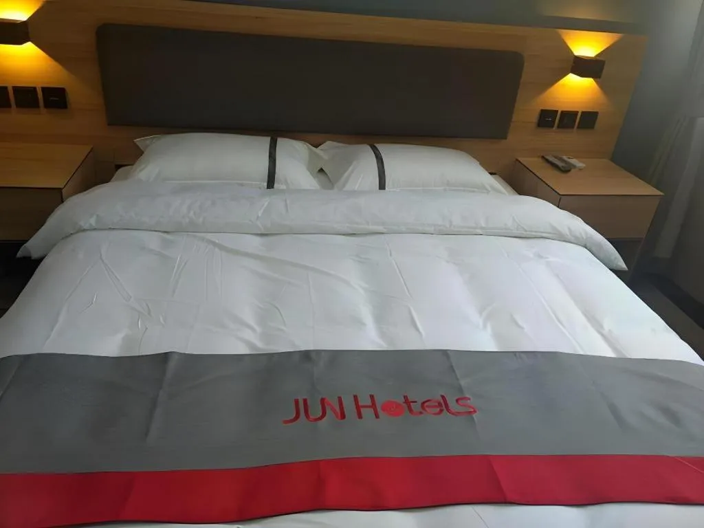 Bed in Jun Hotel Henan Sanmenxia Dennis Plaza