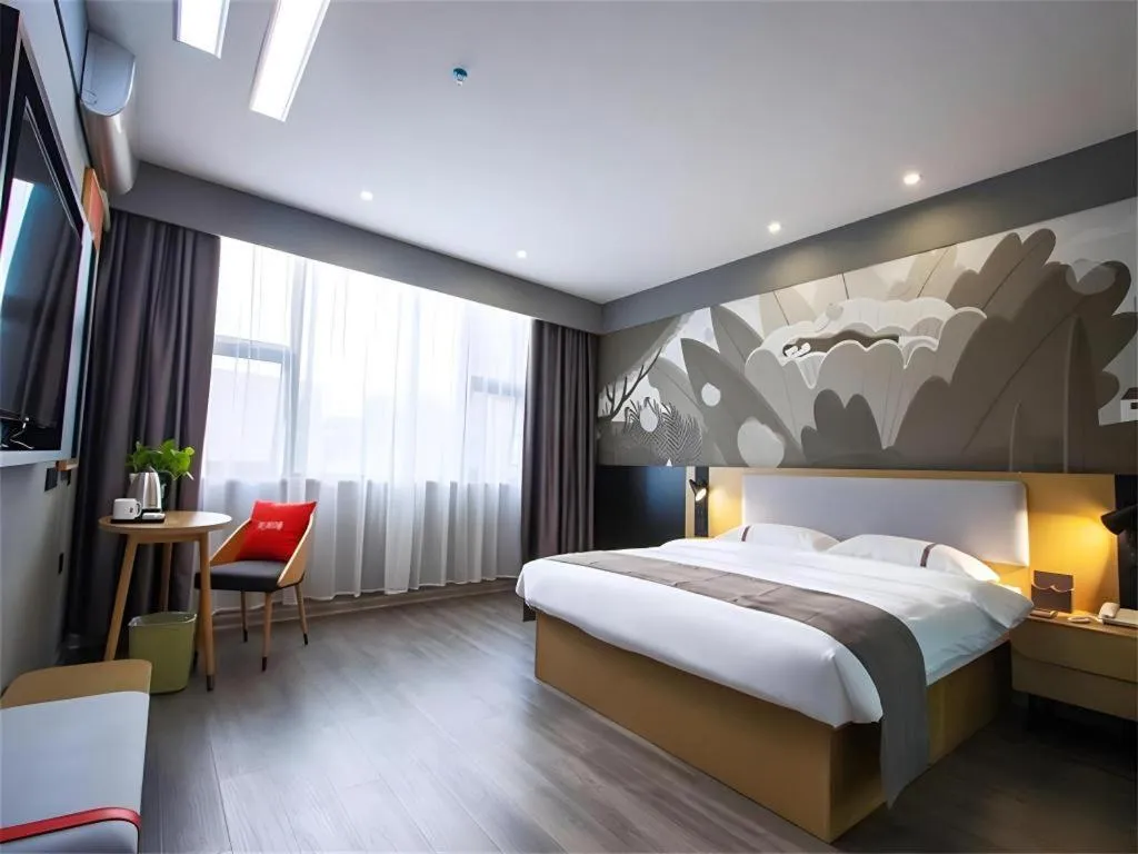 Bed in Thank Inn Hotel Guangxi Hechi Yizhou Sankeshu