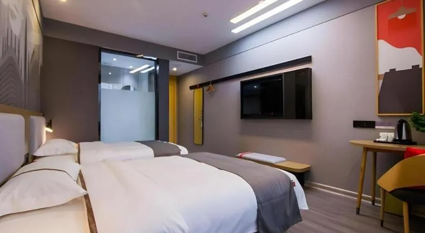 Bed in Thank Inn Hotel Guangxi Hechi Yizhou Sankeshu