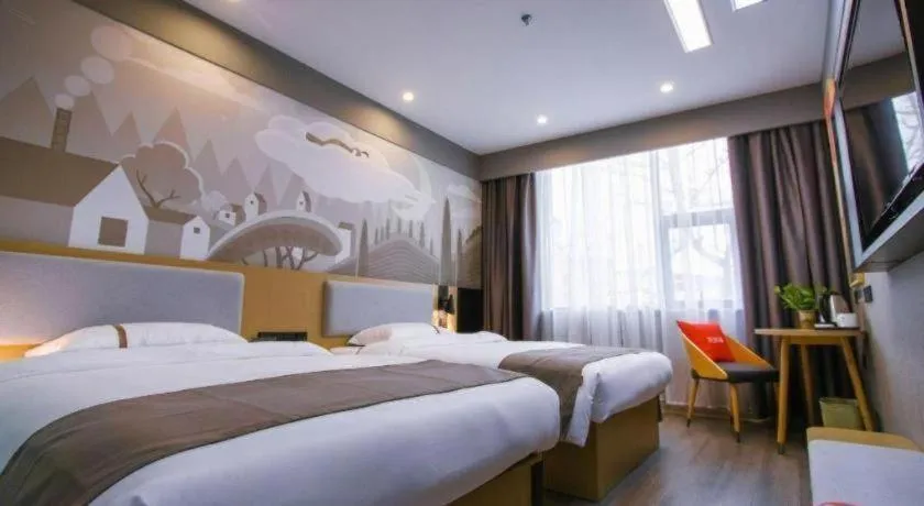 Bed in Thank Inn Hotel Guangxi Hechi Yizhou Sankeshu