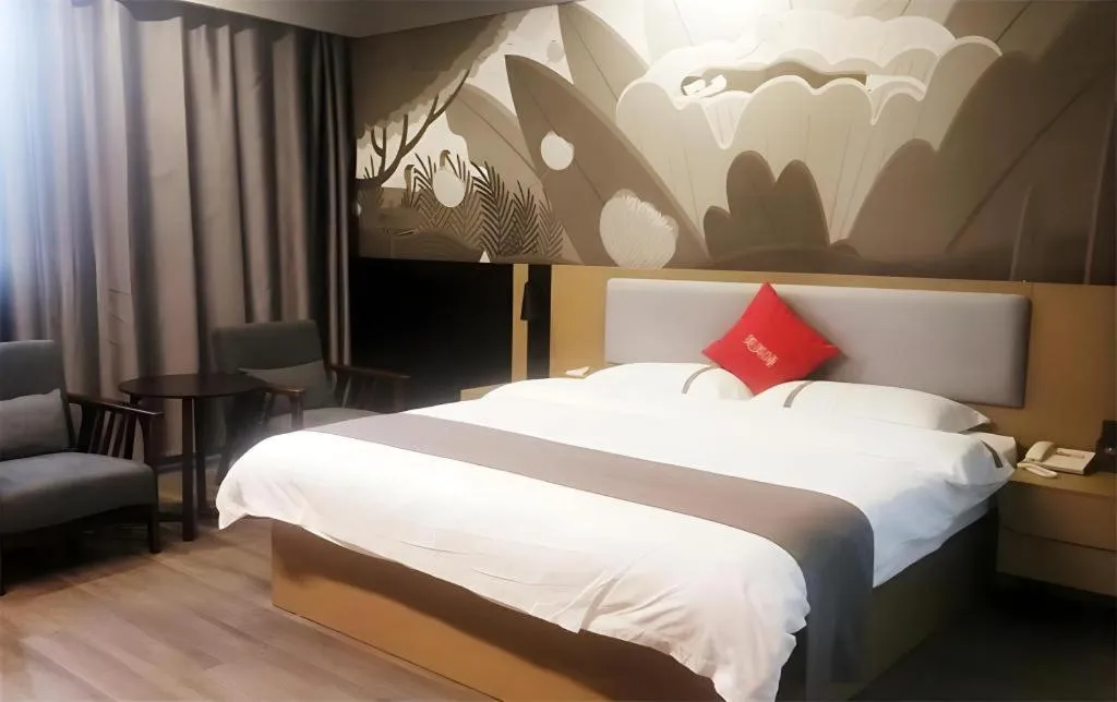 Bed in Thank Inn Hotel Guangxi Hechi Yizhou Sankeshu