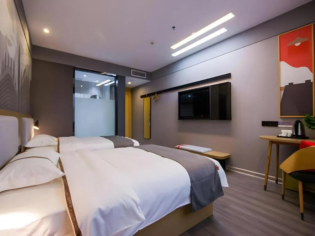 Bed in Thank Inn Hotel Guangxi Hechi Yizhou Sankeshu