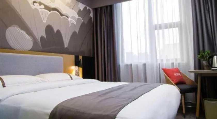 Bed in Thank Inn Hotel Guangxi Hechi Yizhou Sankeshu