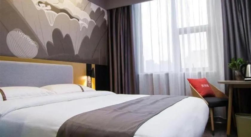 Bed in Thank Inn Hotel Guangxi Hechi Yizhou Sankeshu