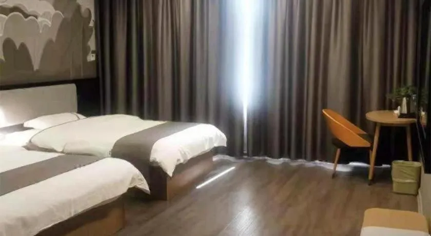 Bed in Thank Inn Hotel Guangxi Hechi Yizhou Sankeshu