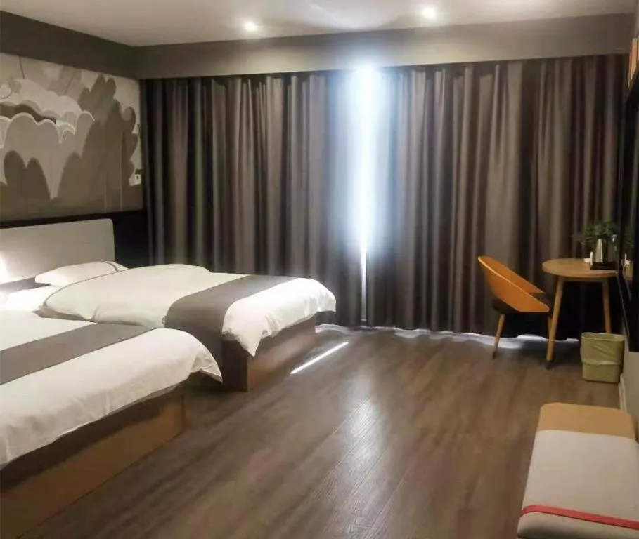 Bed in Thank Inn Hotel Guangxi Hechi Yizhou Sankeshu